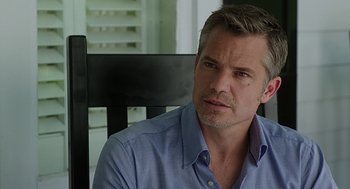 Movie still from “Mother's Day” (2016), directed by Garry Marshall – A person sitting on a chair; Close Up shot, Over the shoulder angle