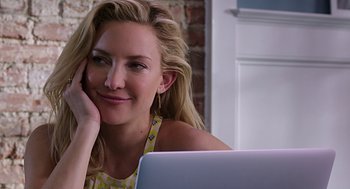 Movie still from “Mother's Day” (2016), directed by Garry Marshall – A woman sitting in front of a laptop computer; Close Up shot, Over the shoulder angle