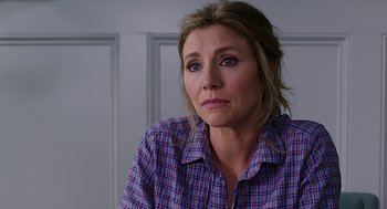 Movie still from “Mother's Day” (2016), directed by Garry Marshall – A person wearing a plaid shirt; Close Up shot, Over the shoulder angle