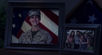 Movie still from “Mother's Day” (2016), directed by Garry Marshall – A picture of a woman in a military uniform; Close Up shot, Over the shoulder angle