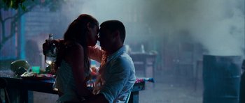 Movie still from “Mr. & Mrs. Smith” (2005), directed by Doug Liman – A man and a woman are kissing in the dark; Medium shot, Low angle