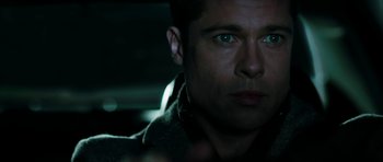 Movie still from “Mr. & Mrs. Smith” (2005), directed by Doug Liman – A person with green eyes; Close Up shot, Over the shoulder angle
