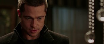 Movie still from “Mr. & Mrs. Smith” (2005), directed by Doug Liman – A person wearing a jacket; Close Up shot, Over the shoulder angle