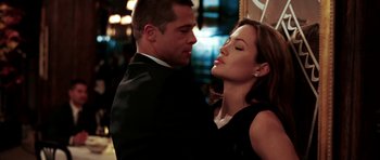 Movie still from “Mr. & Mrs. Smith” (2005), directed by Doug Liman – A man and a woman are dancing together; Close Up shot, Low angle