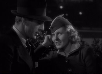 Movie still from “Mr. Deeds Goes to Town” (1936), directed by Frank Capra – A man and a woman are looking at each other; Close Up shot, Over the shoulder angle