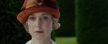 Movie still from “Mr. Holmes” (2015), directed by Bill Condon – A person wearing a hat; Close Up shot, Over the shoulder angle