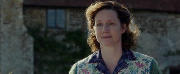 Movie still from “Mr. Holmes” (2015), directed by Bill Condon – A person wearing a floral shirt; Close Up shot, Over the shoulder angle