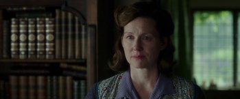 Movie still from “Mr. Holmes” (2015), directed by Bill Condon – A person wearing a shirt; Close Up shot, Over the shoulder angle