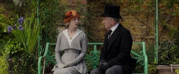 Movie still from “Mr. Holmes” (2015), directed by Bill Condon – A man and a woman sitting on a bench; Medium shot, Over the shoulder angle