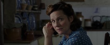 Movie still from “Mr. Holmes” (2015), directed by Bill Condon – A person sitting in front of a window; Close Up shot, Over the shoulder angle