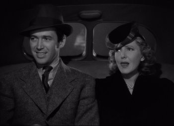 Movie still from “Mr. Smith Goes to Washington” (1939), directed by Frank Capra – A man and a woman sitting in the back of a car; Close Up shot, Low angle