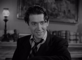 Movie still from “Mr. Smith Goes to Washington” (1939), directed by Frank Capra – Black and white photograph of a man in a suit and tie; Close Up shot, Low angle