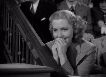 Movie still from “Mr. Smith Goes to Washington” (1939), directed by Frank Capra – An old photo of a woman sitting in a chair; Close Up shot, High angle