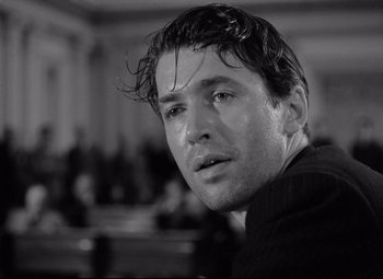 Movie still from “Mr. Smith Goes to Washington” (1939), directed by Frank Capra – Black and white photograph of a man with wet hair; Close Up shot, Low angle