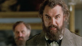 Movie still from “Mrs. Brown” (1997), directed by John Madden – A man with a long beard and a mustache; Close Up shot, Low angle