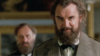 Movie still from “Mrs. Brown” (1997), directed by John Madden – A man with a long beard and a mustache; Close Up shot, Low angle