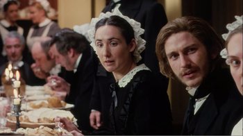 Movie still from “Mrs. Brown” (1997), directed by John Madden – A group of people sitting around a table; Close Up shot, Over the shoulder angle