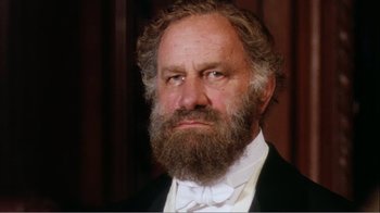 Movie still from “Mrs. Brown” (1997), directed by John Madden – An old man with a beard and a white bow tie; Close Up shot, Low angle