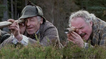 Movie still from “Mrs. Brown” (1997), directed by John Madden – Two men in a field looking at something through a telescope; Medium shot, High angle