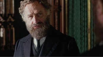 Movie still from “Mrs. Brown” (1997), directed by John Madden – A man with a beard and a suit; Close Up shot, Low angle