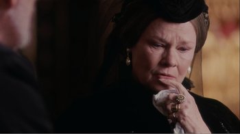 Movie still from “Mrs. Brown” (1997), directed by John Madden – An older woman is looking at the camera; Close Up shot, High angle