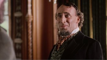 Movie still from “Mrs. Brown” (1997), directed by John Madden – A person wearing a suit and tie; Close Up shot, Low angle