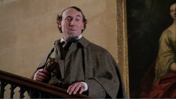 Movie still from “Mrs. Brown” (1997), directed by John Madden – A wax figure of a man in a suit and tie; Medium shot, Low angle