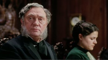 Movie still from “Mrs. Brown” (1997), directed by John Madden – An older man with a beard and a long beard; Close Up shot, Over the shoulder angle