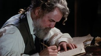 Movie still from “Mrs. Brown” (1997), directed by John Madden – An older man writing on a piece of paper; Close Up shot, High angle