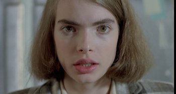 Movie still from “Ms .45” (1981), directed by Abel Ferrara – A person's eyes and face; Close Up shot, High angle