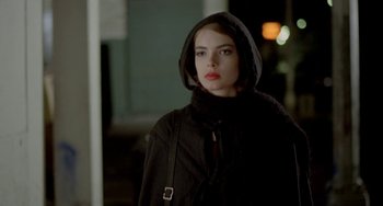 Movie still from “Ms .45” (1981), directed by Abel Ferrara – A woman in a black coat and a hood; Close Up shot, Low angle