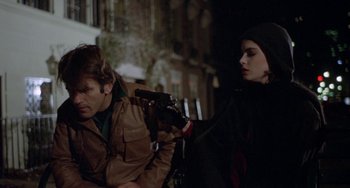 Movie still from “Ms .45” (1981), directed by Abel Ferrara – A man and a woman are sitting on a bench together; Medium shot, Over the shoulder angle