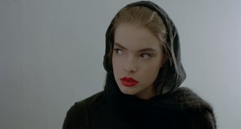 Movie still from “Ms .45” (1981), directed by Abel Ferrara – A person wearing a hooded sweatshirt; Close Up shot, Low angle
