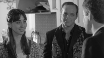 Movie still from “Much Ado About Nothing” (2012), directed by Joss Whedon – A black and white photo of a man and a woman; Close Up shot, Over the shoulder angle