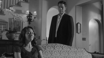 Movie still from “Much Ado About Nothing” (2012), directed by Joss Whedon – A man and a woman standing in a room; Medium shot, Over the shoulder angle