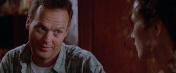 Movie still from “Multiplicity” (1996), directed by Harold Ramis – A man's face in a plaid shirt; Close Up shot, Low angle