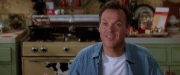 Movie still from “Multiplicity” (1996), directed by Harold Ramis – A person wearing a jean jacket; Close Up shot, Low angle