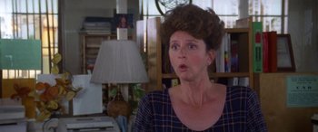Movie still from “Multiplicity” (1996), directed by Harold Ramis – An older woman with a surprised look on her face; Close Up shot, Low angle
