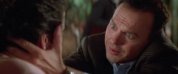 Movie still from “Multiplicity” (1996), directed by Harold Ramis – A person talking to another person; Close Up shot, Over the shoulder angle