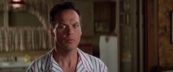 Movie still from “Multiplicity” (1996), directed by Harold Ramis – A person wearing a striped shirt; Close Up shot, Low angle