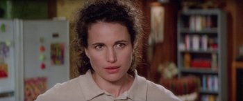 Movie still from “Multiplicity” (1996), directed by Harold Ramis – A person wearing a shirt; Close Up shot, Over the shoulder angle