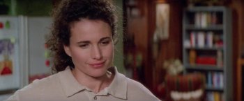 Movie still from “Multiplicity” (1996), directed by Harold Ramis – A person wearing a white shirt; Close Up shot, Over the shoulder angle