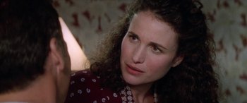 Movie still from “Multiplicity” (1996), directed by Harold Ramis – A person with curly hair; Close Up shot, Over the shoulder angle