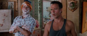 Movie still from “Multiplicity” (1996), directed by Harold Ramis – A man with a shaving cream on his face and another man with shaving cream on his face; Close Up shot, Over the shoulder angle