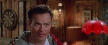 Movie still from “Multiplicity” (1996), directed by Harold Ramis – A person wearing a red jacket; Close Up shot, Over the shoulder angle