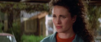 Movie still from “Multiplicity” (1996), directed by Harold Ramis – A person looking sad; Close Up shot, Over the shoulder angle