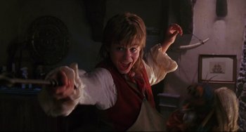 Movie still from “Muppet Treasure Island” (1996), directed by David Lane – A young girl is smiling and holding her arms in the air; Medium shot, Low angle