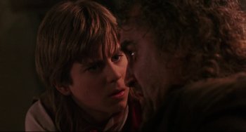 Movie still from “Muppet Treasure Island” (1996), directed by David Lane – A young man and a younger man face to face; Close Up shot, Over the shoulder angle