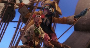 Movie still from “Muppet Treasure Island” (1996), directed by David Lane – A couple of stuffed animals that are next to each other; Medium shot, Low angle