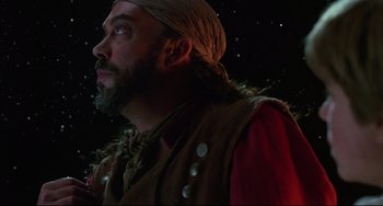 Movie still from “Muppet Treasure Island” (1996), directed by David Lane – A man with a beard wearing a turban; Close Up shot, Low angle